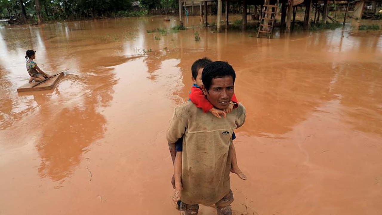 Rettungskräfte in Laos suchen weiter nach Vermissten