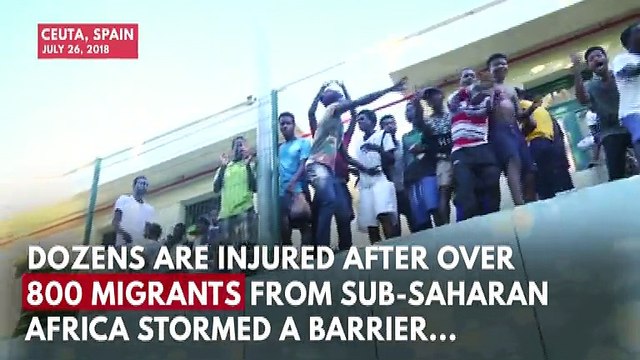 Over 800 Migrants Storm Spain's Ceuta Border With Morocco