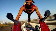 Yoga tricks on a Motocycle .حركات اليوغة فوق دراجة نارية