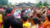 Baby rescued from flood waters after dam bursts in Laos