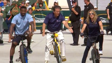 Stacey Dales defeats Steve Mariucci and James Jones in bicycle race