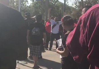 Security Guard Leads LA Galaxy Fan Away From LAFC Supporters as Local Rivalry Takes Shape
