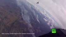 فيديو ..الجيش السويدى يقصف غابات البلاد لإخماد الحرائق
