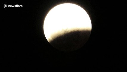 Filmer in South Africa captures initial phase of total lunar eclipse
