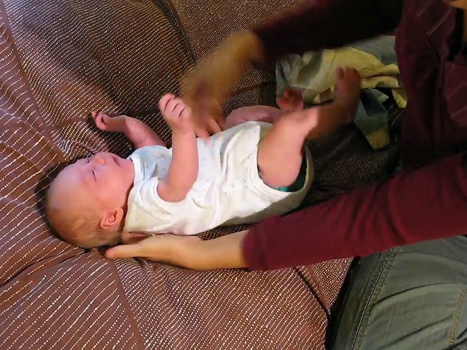 One month old demonstrates newborn reflexes