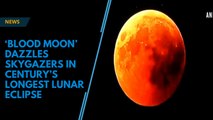 ‘Blood moon’ dazzles skygazers in century’s longest lunar eclipse