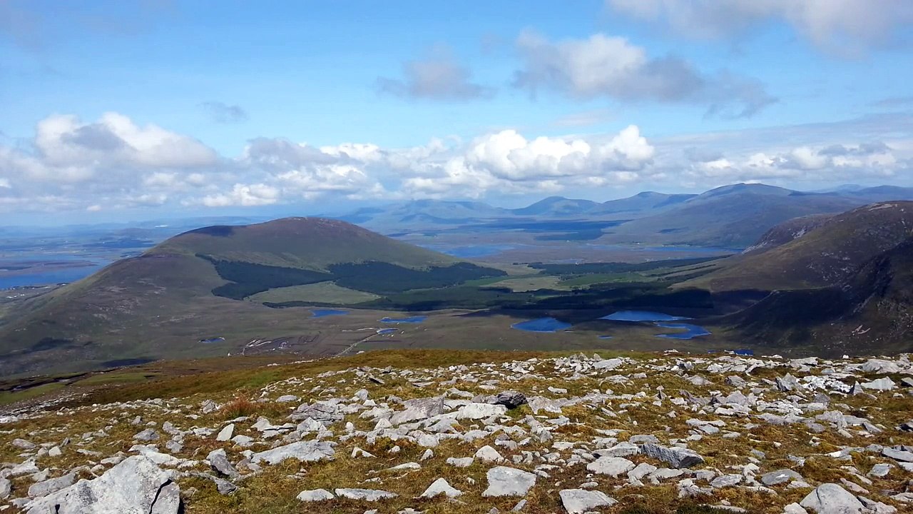 View North from Curraune Hill ; clouds' shadows moving across landscape