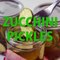 These REFRIGERATOR ZUCCHINI PICKLES are a fantastic way to use up that ever abundant late-summer zucchini. They are fun and easy to make and SO tasty![Click