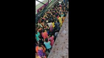 Women battle rush-hour crush to get into Mumbai train