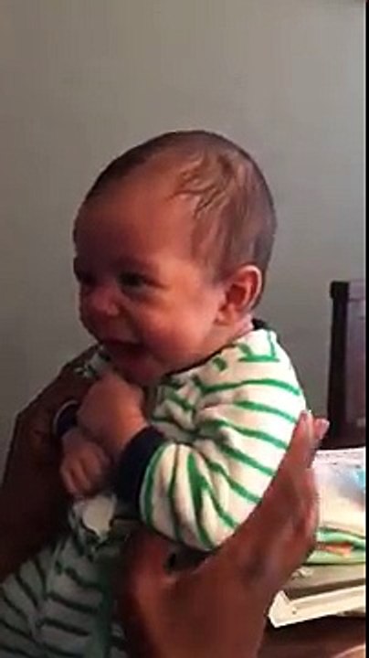 Newborn laughing out loud