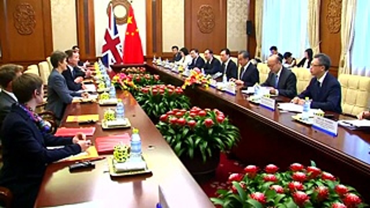 China tempts UK with trade pact as U.S. shuns both