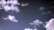 Timelapse - Thin white clouds moving across the sky