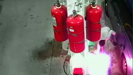 Man casually sets a New York petrol station on fire