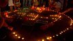 Свечи в память о погибших при пожарах в Греции