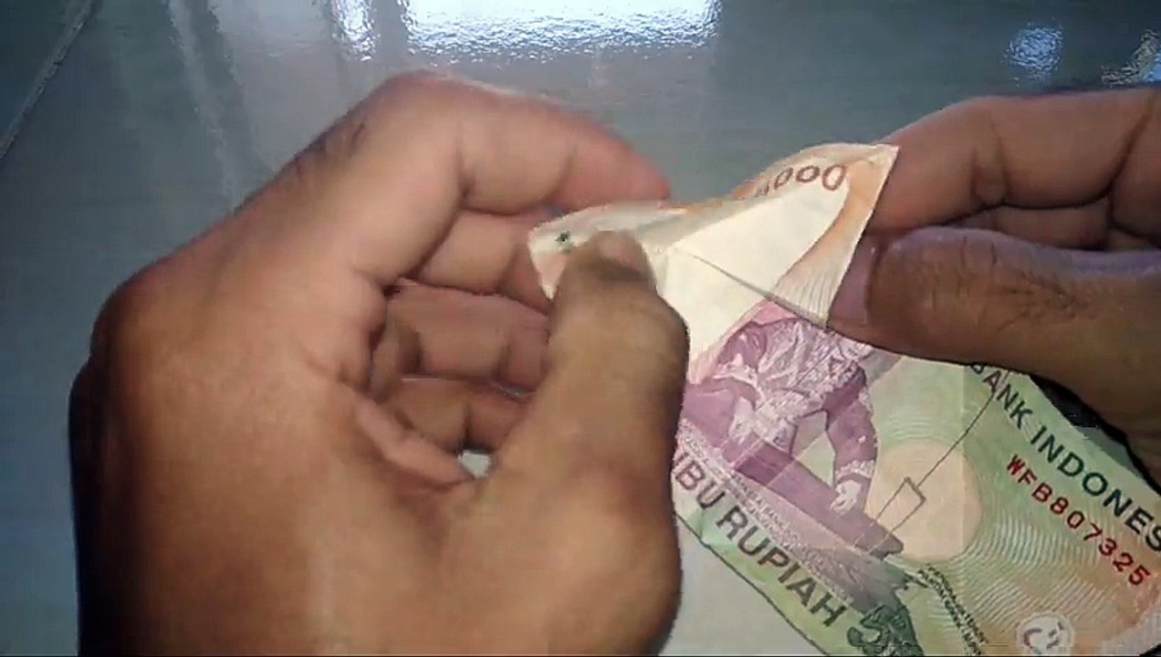 Origami seni melipat uang kertas menjadi mahar Pernikahan