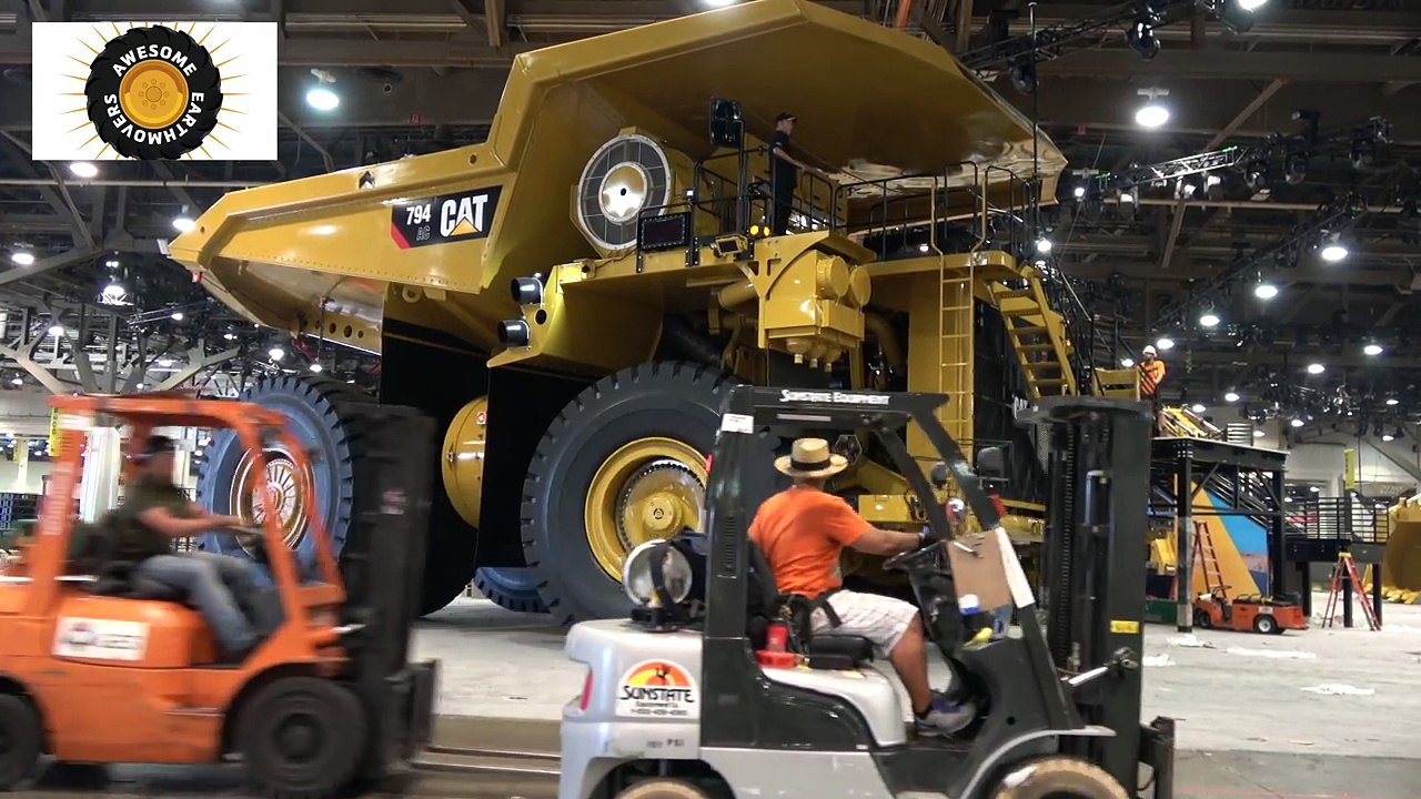 Moving a massive Caterpillar 794AC dump truck