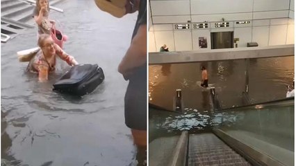 Sıcaklardan bunalan İsveçliler su baskınının tadını çıkardı