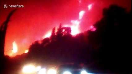 Video captures terrifying moment woman flees with children from Carr Fire