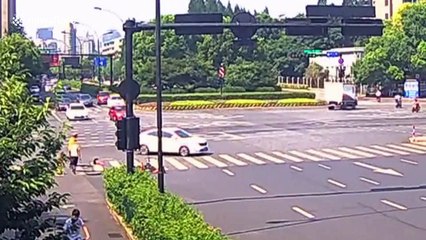Double misfortune! Woman falls into well after being knocked from scooter