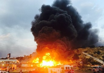 Fireballs Erupt From Warehouse Blaze Near Gas Station in Gallup, New Mexico