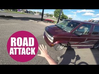 British cyclist was clipped by a van before the driver tried to attack him with a CANE