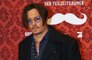 Johnny Depp claims Amber Heard punched him