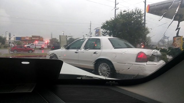 Paying Respects in the Pouring Rain