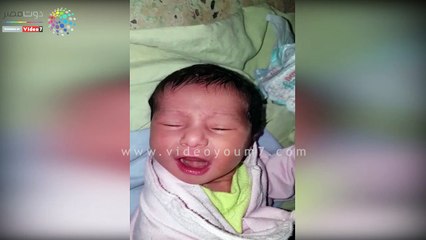 رجل وسيدة يلقيان طفلة رضيعة أمام باب شقة بشبرا الخيمة