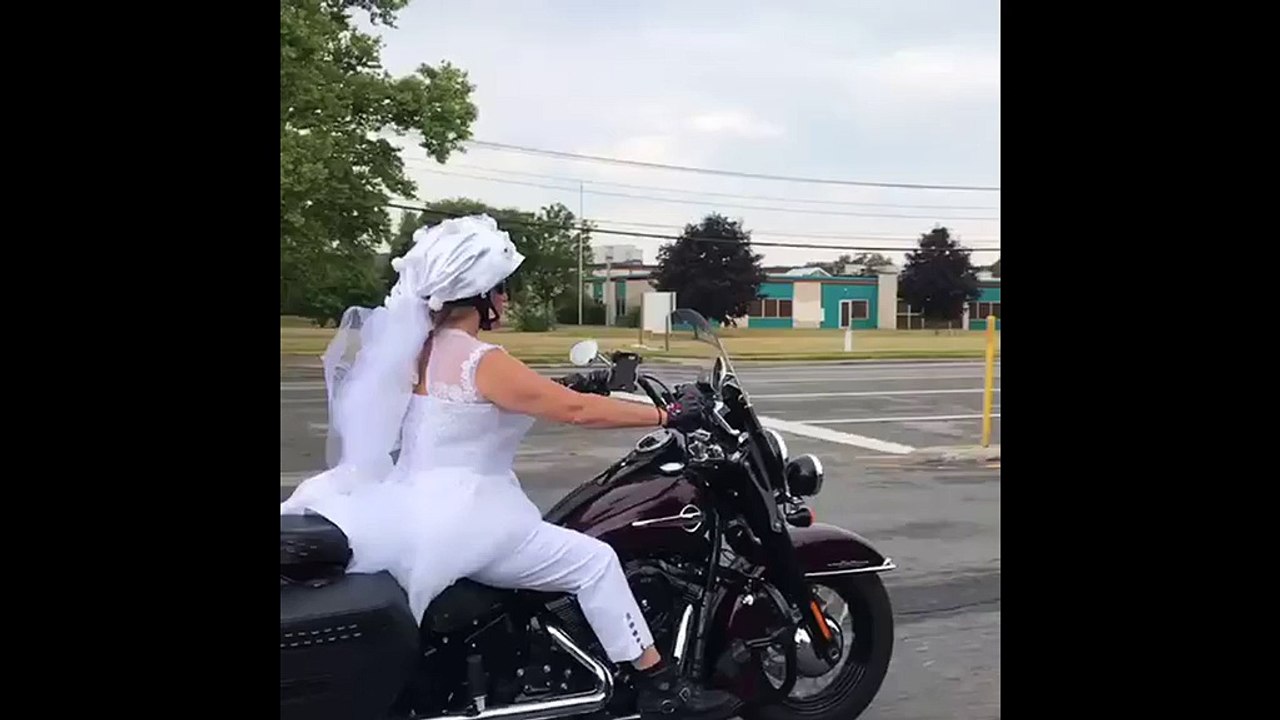 Bride rides Harley in wedding dress to her ceremony