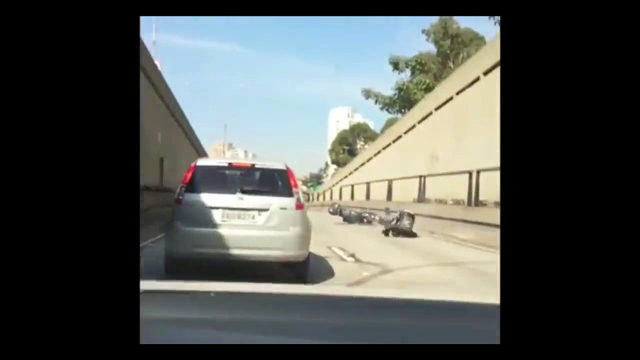 Biker Kicks Car and Gets Instant Karma