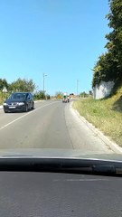 Risky Place to Tow a Kids Bicycle