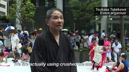 Sweltering Tokyo holds 'Summer Snow Festival' to cool down