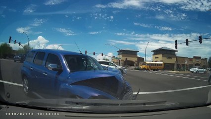 Car Runs Red Light Causing Intersection Accident