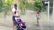 Parisians, tourists turn to fountains for summer relief