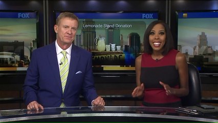 8-Year-Old Boy Presents Police with Thousands He Raised with Lemonade Stand