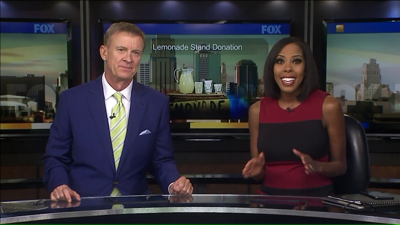 8-Year-Old Boy Presents Police with Thousands He Raised with Lemonade Stand