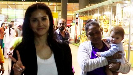 Sunny Leone With Her Kid Spotted At Mumbai Airport