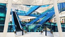 Shopping centres swooping entrances drag people inside says architect