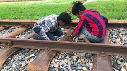 Unbelievable ! Brave Brothers Catch Python Snake On The Road While Driving On The Rail Way