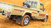 Toyota Land Cruiser stuck in desert sand