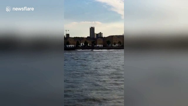 Police pursue speeding Jet Ski riders on the Thames