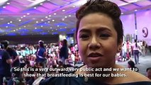 Thousands of Philippine mothers breastfeed in public to counter stigma