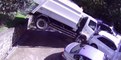 Runaway Garbage Truck Jumps Wall and Crashes Into Cars