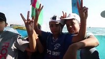 #شاهد : رسائل لاحرار العالم باللغة الانجليزية على هامش المسيرة البحرية اليوم في ميناء غزة