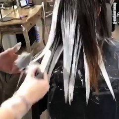 Naturally black hair goes silver blonde