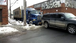 GMC Yukon pulling big rig.