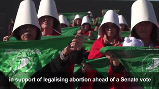 'Handmaids' march as Argentina abortion law vote approaches