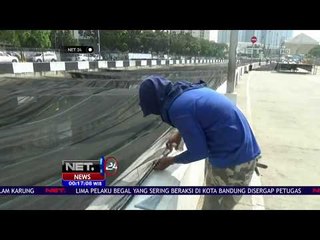 Pemasangan Waring Hitam di Kali Item - NET 24