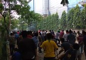 Police and Student Protesters Clash Outside Dhaka University