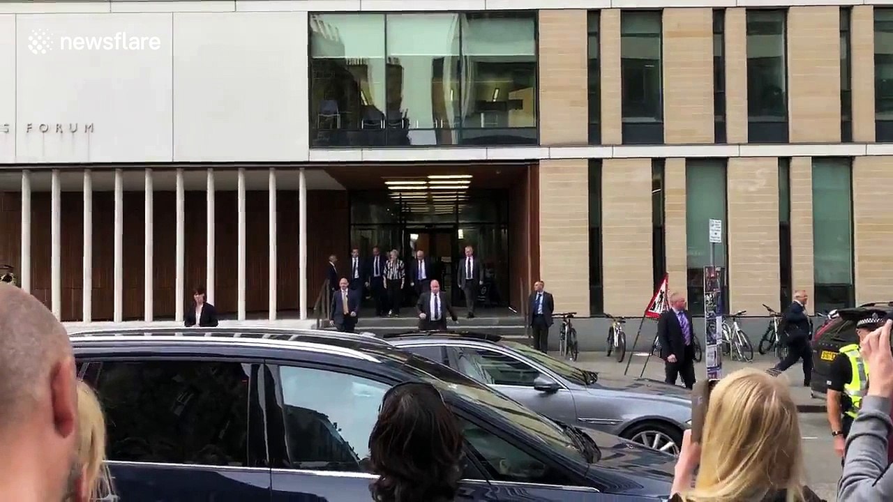 Theresa May puts on brave face after being met with chorus of boos in Edinburgh